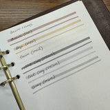 A close-up of Zebra Mildliner highligher color swatches for Brown, Beige, Cream, Dark Grey, Cool Grey, and Grey.