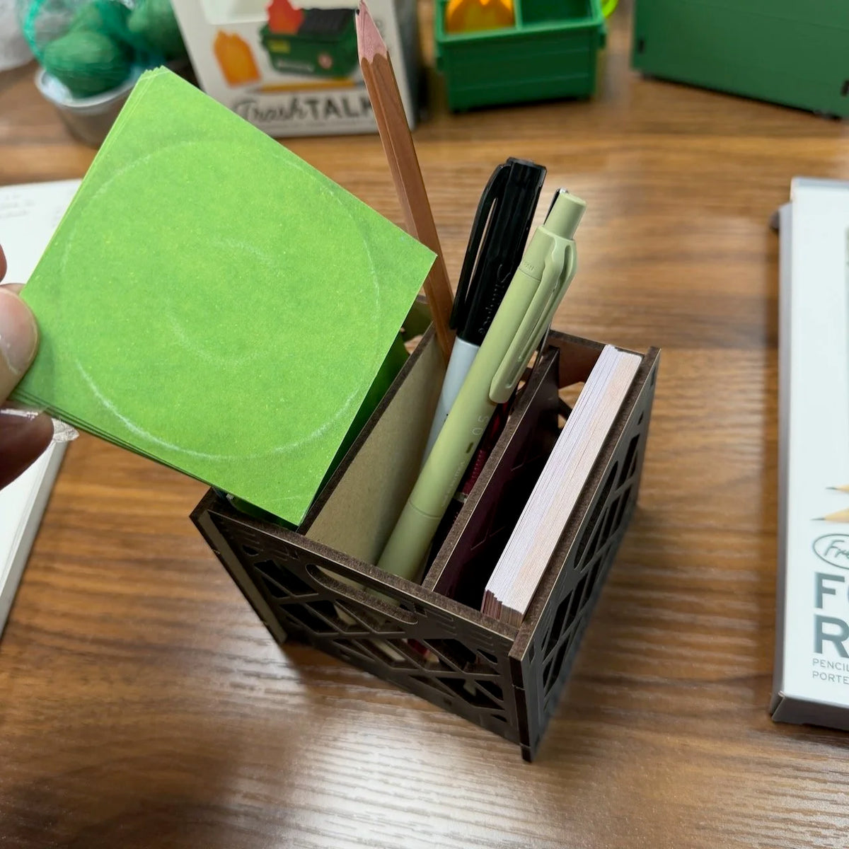 Fred & Friends For the Record Record Crate Desk Caddie shown holding notes and pencils and pens