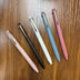 Anterique Stationers 3-Color Multi-Pens arrayed on Table