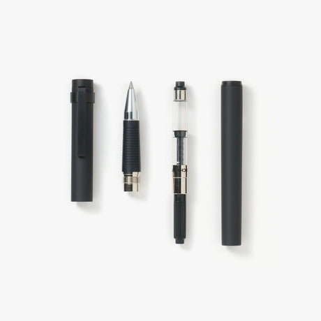 Kakimori Matte Aluminum Rollerball Pen Disassembled showing components on white background 