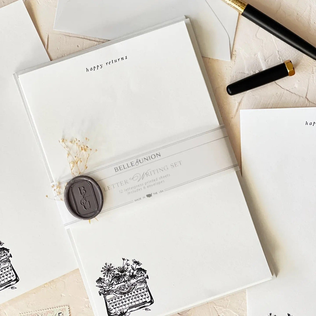 Belle & Union Boxed Notes White paper Showing a typewriter with flowers emerging