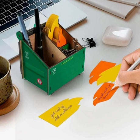 Fred & Friends Desk Dumpster Desk Caddie with Fire Notecards showing someone writing notes