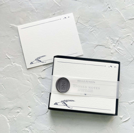 Belle & Union Boxed Notes White paper featuring a feather quill pen