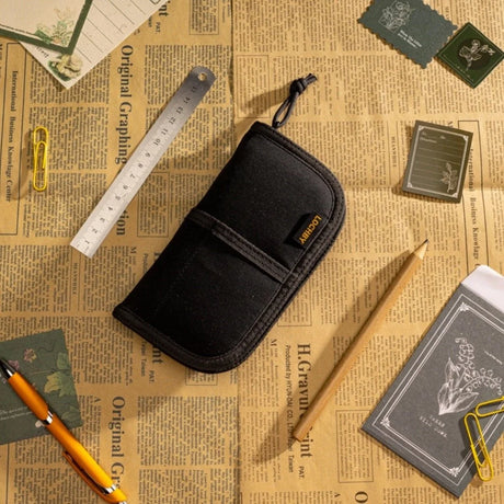Lochby Quattro Four-Pen Case Charcoal on Desk