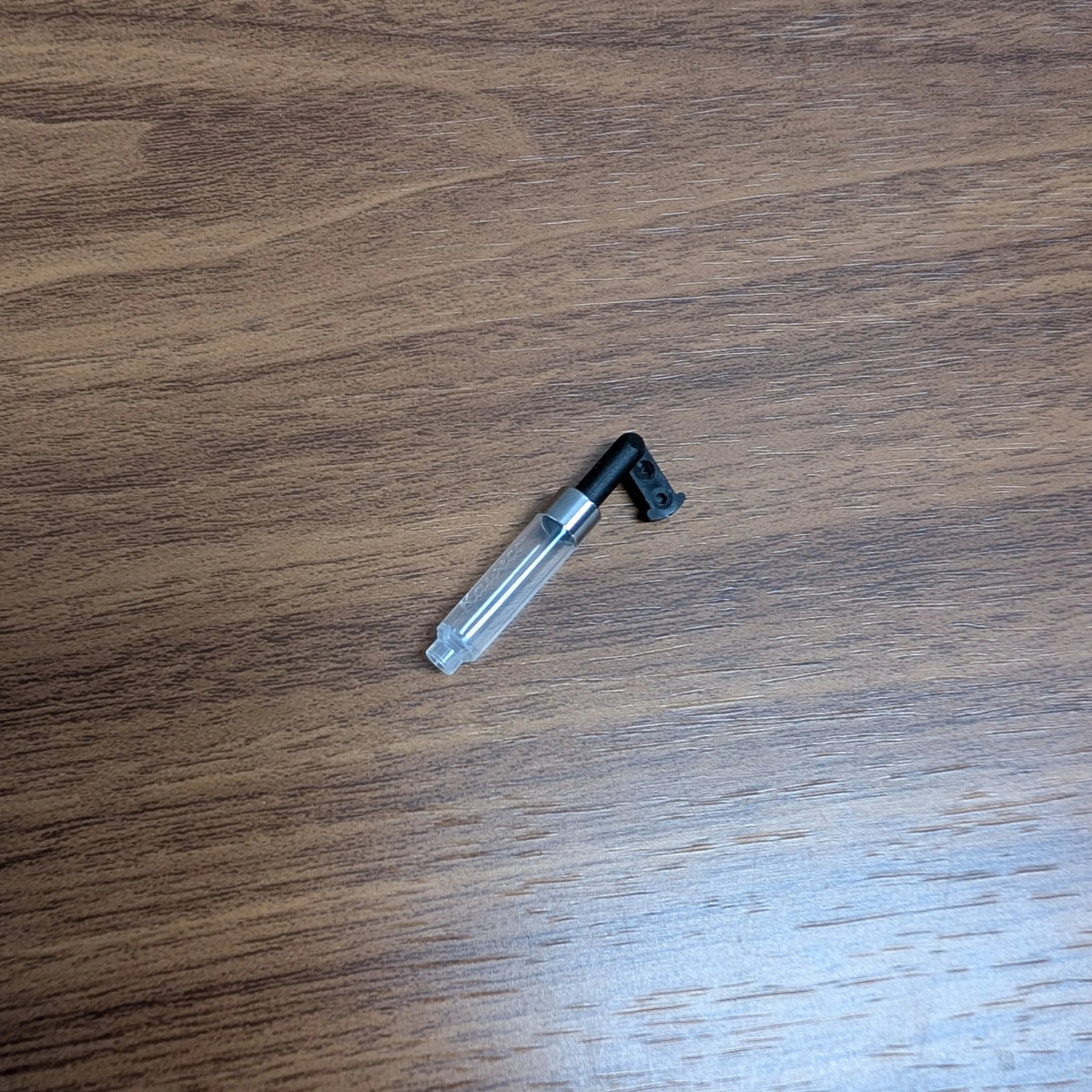 Kaweco folding mini converter for compatible fountain pens.