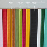 A Lovely Everyday notebooks arrayed on shelf in a range of thicknesses comparing how thick the various spines are in multiple page counts of 64, 256, 320, and 608 Pages