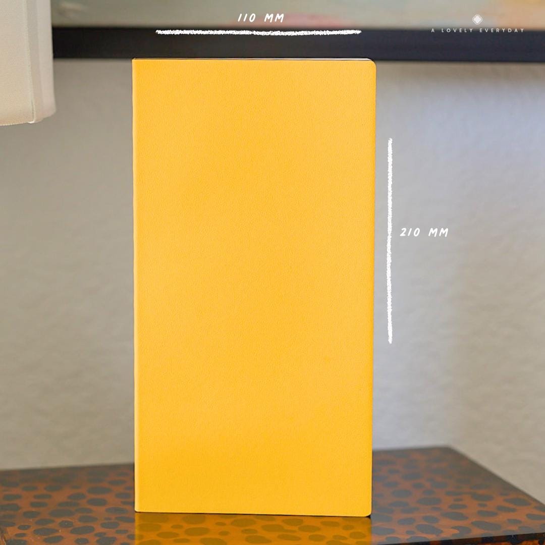 A Lovely Everyday Cosmo Air Light A5-Slim Notebook in Yellow "Joy Story" Cover Showing Dimensions