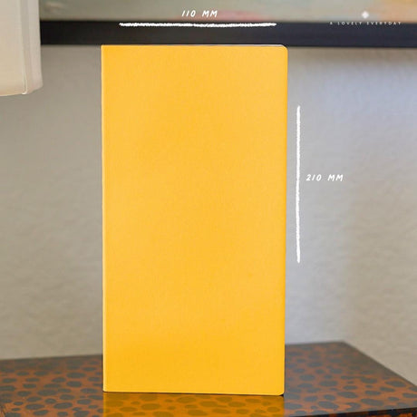 A Lovely Everyday Cosmo Air Light A5-Slim Notebook in Yellow "Joy Story" Cover Showing Dimensions