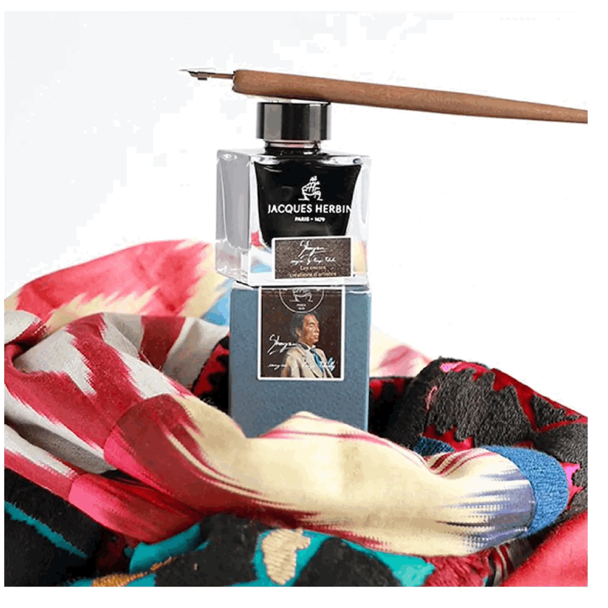 J. Herbin Shogun Fountain Pen Ink Bottle Stacked on Box with Dip Pen