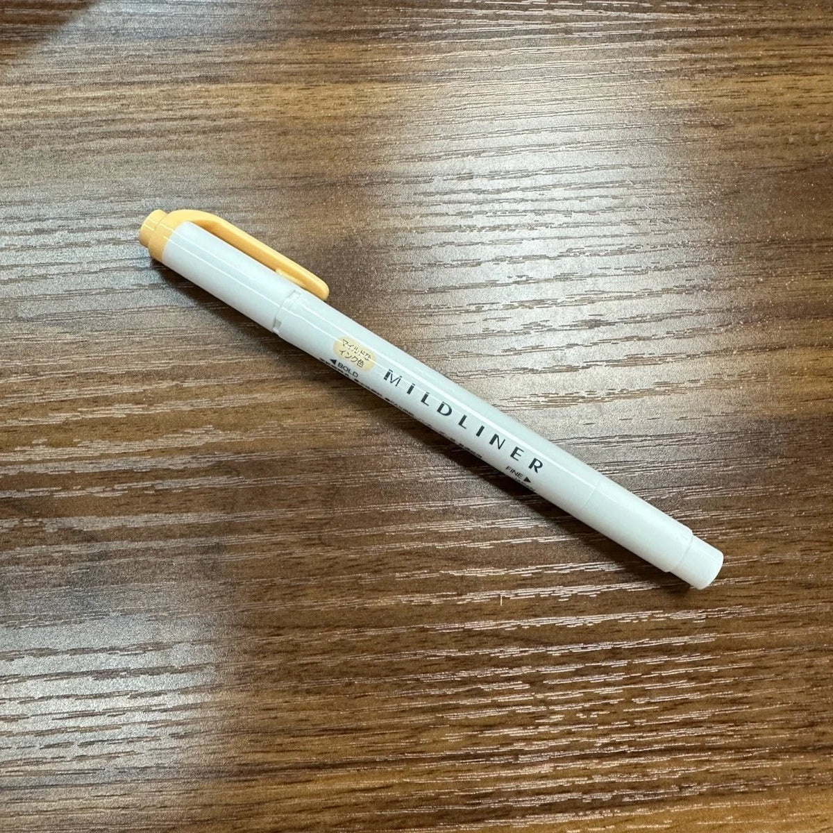 Zebra Mildliner highlighter with bold and  fine tips in Honey Orange (MHOR)