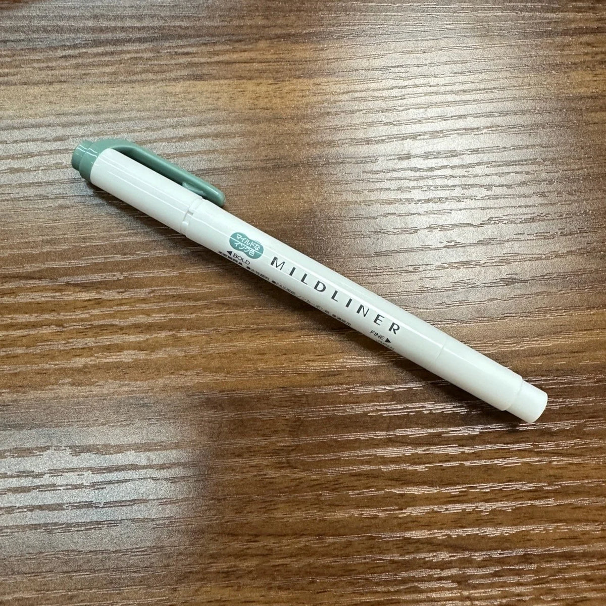 Zebra Mildliner highlighter with bold and  fine tips in Moss Green (MMG)